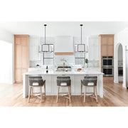 Carlyn 6 Light 24" Pendant in Black in a room setting
