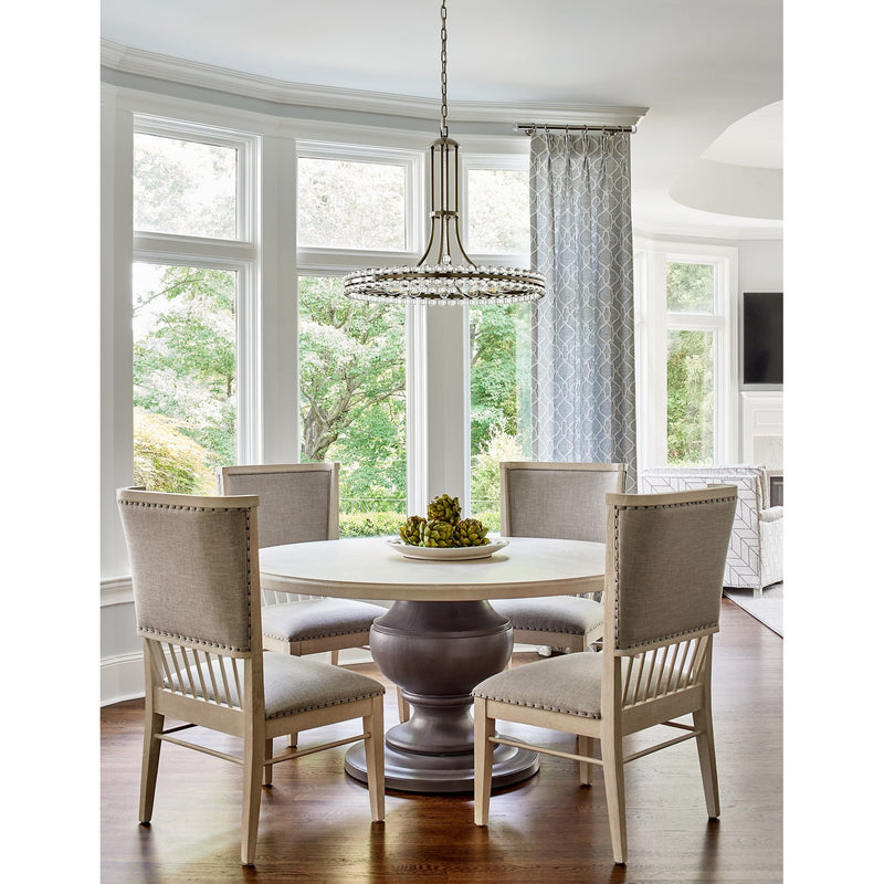 Clover 12 Light 28.75" Chandelier in Aged Brass in a room setting