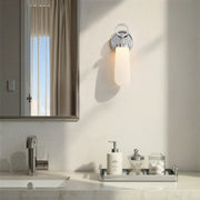 Calvin 1 Light 4.75" Integrated LED Sconce in Polished Nickel in a room setting