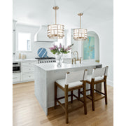 Danielson 4 Light 16.75" Chandelier in Vibrant Gold in a room setting