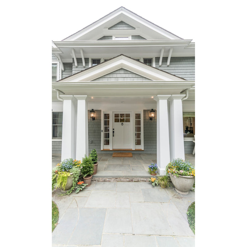 Dumont 3 Light 9.25" Outdoor Sconce in Graphite in a room setting