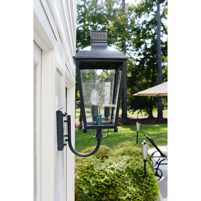Dumont 3 Light 9.25" Outdoor Sconce in Graphite in a room setting