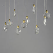 Pebble 10-Light LED Pendant in Black / Polished Gold