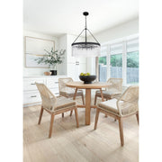 Emory 8 Light 24" Chandelier in Black Forged in a room setting