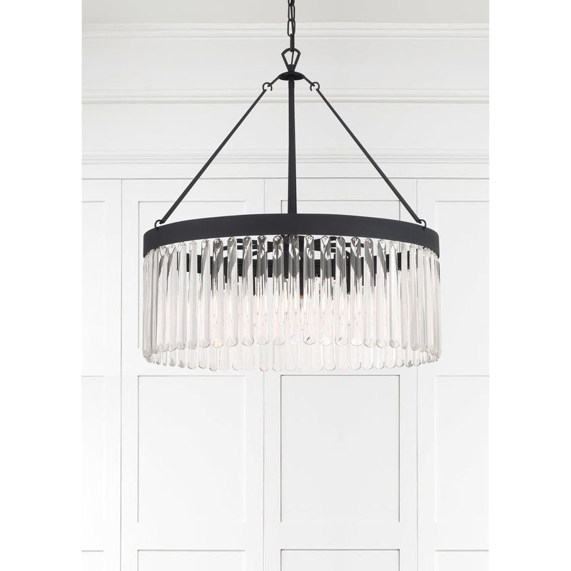 Emory 8 Light 24" Chandelier in Black Forged in a room setting