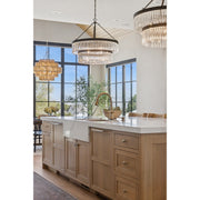 Emory 9 Light 32" Chandelier in Black Forged in a room setting
