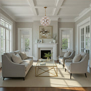 Esme 6 Light 18.25" Chandelier in Aged Brass in a room setting
