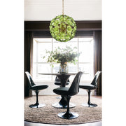 Esme 9 Light 22.5" Chandelier in Aged Brass in a room setting