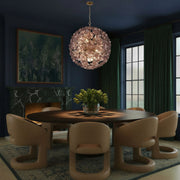 Esme 12 Light 28" Chandelier in Aged Brass in a room setting