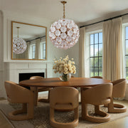 Esme 12 Light 28" Chandelier in Aged Brass in a room setting