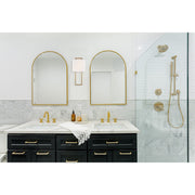 Fremont 2 Light 10" Sconce in Vibrant Gold in a room setting