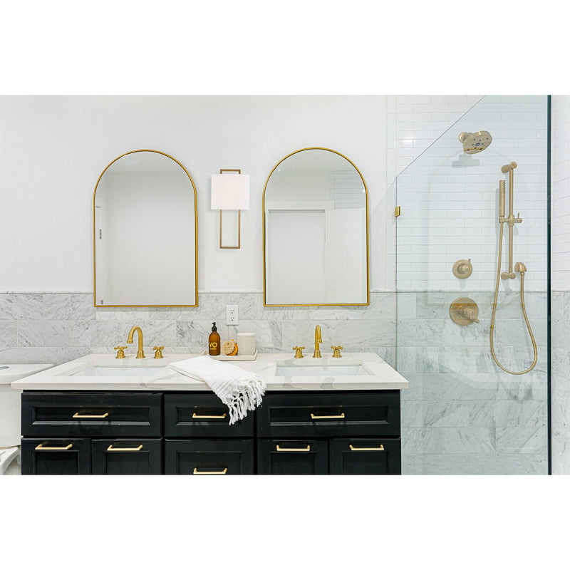 Fremont 2 Light 10" Sconce in Vibrant Gold in a room setting