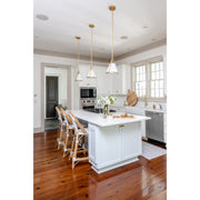 Fulton 1 Light 9.25" Pendant in Antique Gold in a room setting