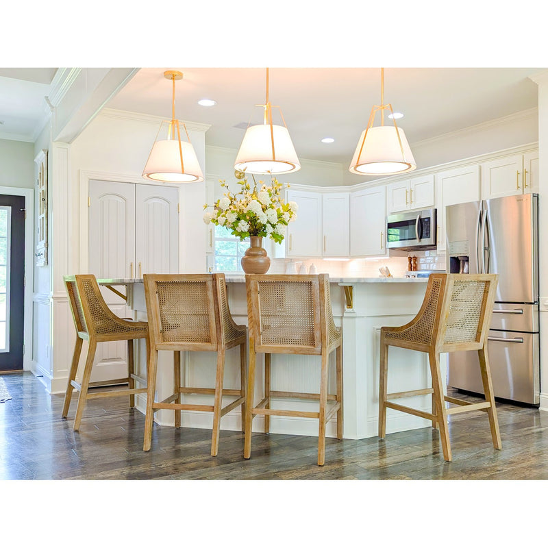 Fulton 3 Light 20" Pendant in Antique Gold in a room setting