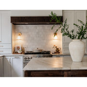 Fulton 1 Light 6.25" Sconce in Antique Gold in a room setting