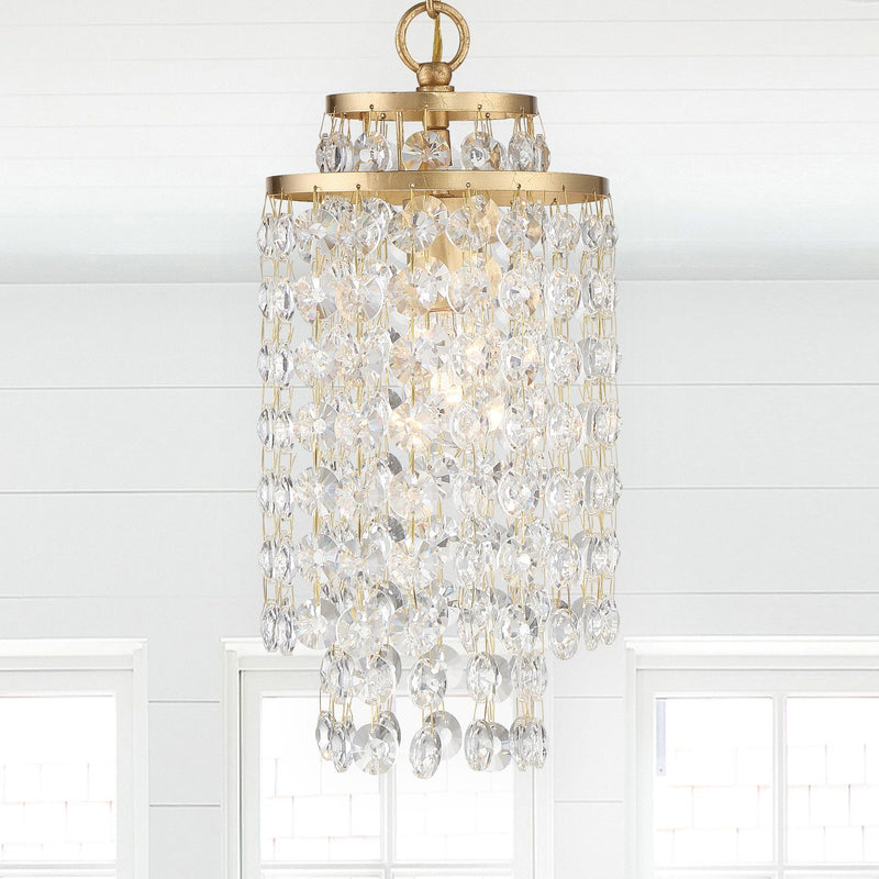 Gabrielle 1 Light 7" Pendant in Antique Gold in a room setting