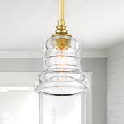 Gregory 1 Light 5" Pendant in Aged Brass in a room setting