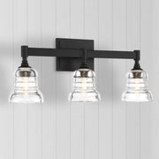 Gregory 3 Light 23.75" Bathroom Vanity in Matte Black in a room setting