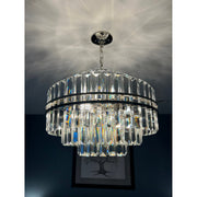 Hayes 12 Light 22" Pendant in Polished Nickel in a room setting