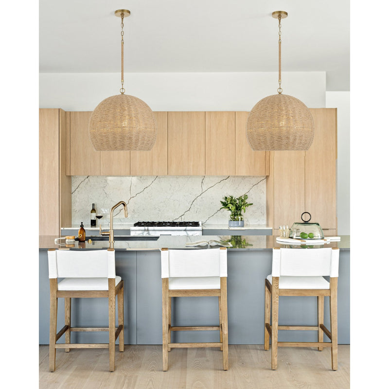 Jace 3 Light 20" Pendant in Soft Gold in a room setting