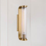 Jarvis 1 Light 4.25" LED Sconce in Aged Brass in a room setting