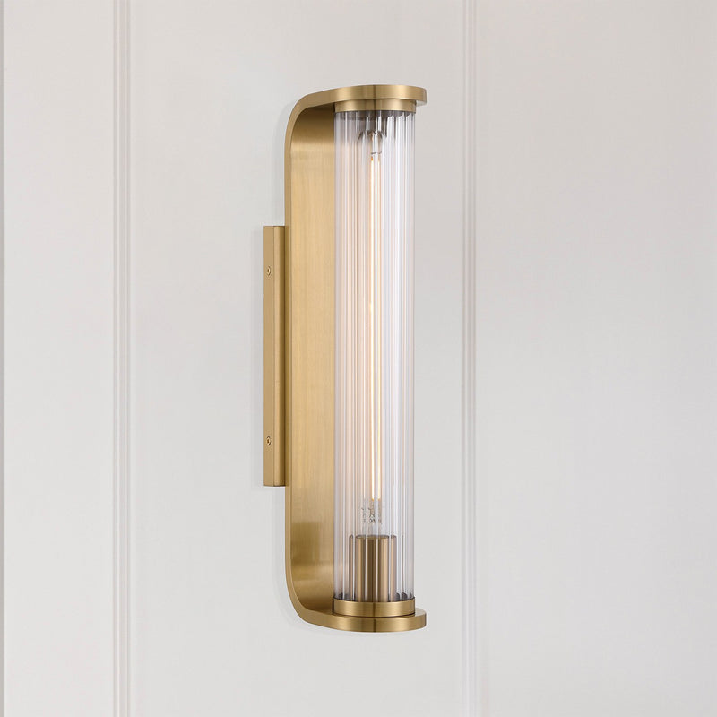 Jarvis 1 Light 4.25" LED Sconce in Aged Brass in a room setting