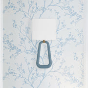 Jori 2 Light 10" Sconce in Aged Brass + Blue in a room setting