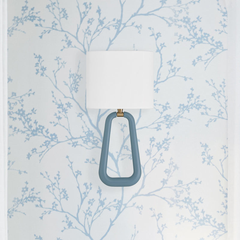 Jori 2 Light 10" Sconce in Aged Brass + Blue in a room setting