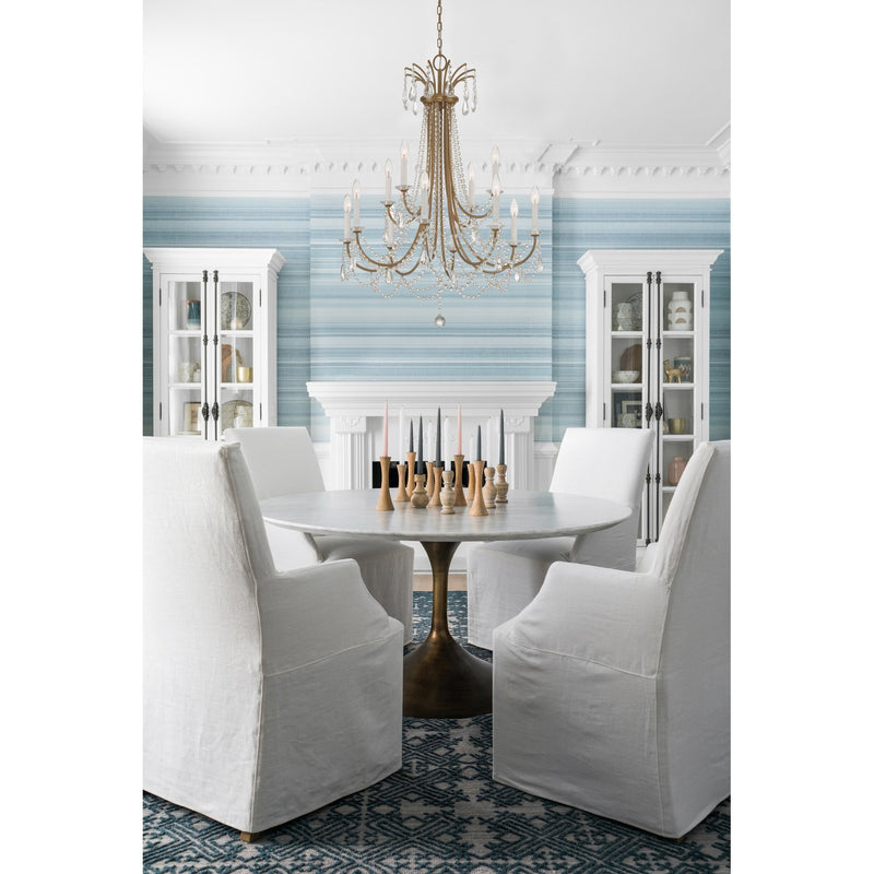 Karrington 12 Light 30" Chandelier in Aged Brass in a room setting