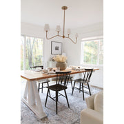 Keenan 4 Light 48" Linear Chandelier in Vibrant Gold in a room setting