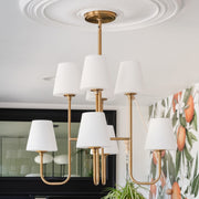 Keenan 8 Light 28" Chandelier in Vibrant Gold in a room setting