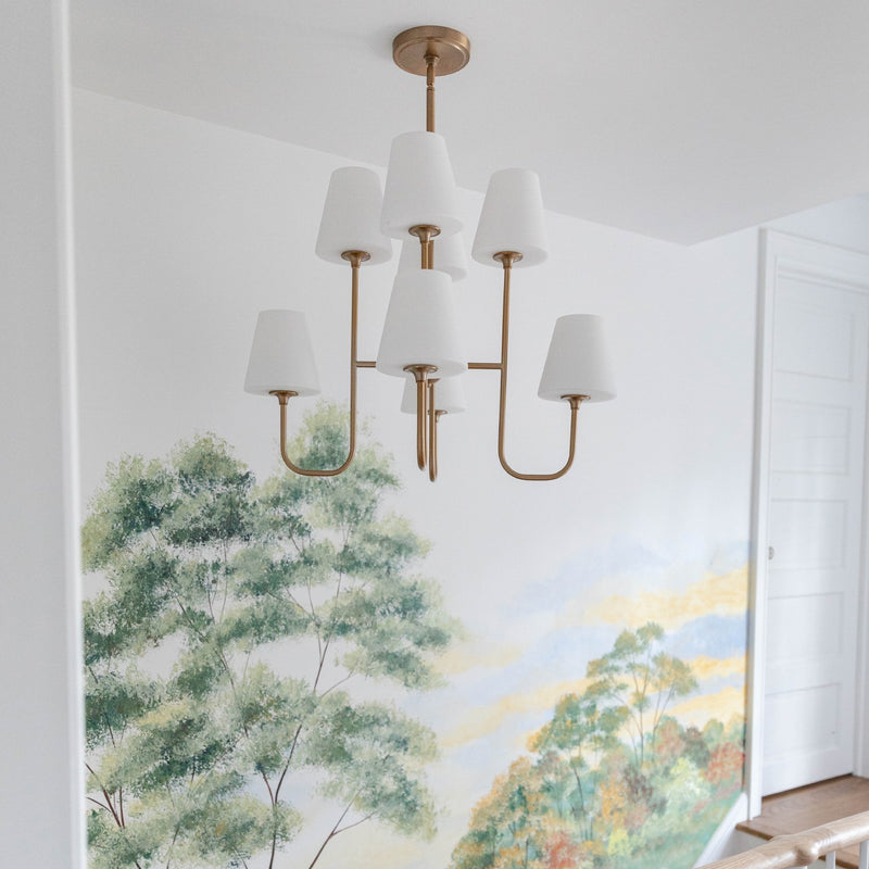 Keenan 8 Light 28" Chandelier in Vibrant Gold in a room setting