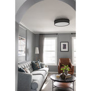 Kendal 4 Light 22.5" Flush Mount in Black Forged in a room setting