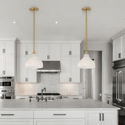 Layton 1 Light 9.75" Pendant in Luxe Gold in a room setting