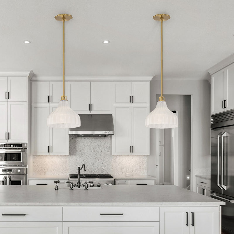 Layton 1 Light 9.75" Pendant in Luxe Gold in a room setting