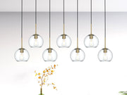Baxter 7-Light 54" Clear Glass Linear Pendant in Satin Gold And Clear