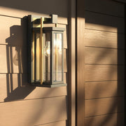 Lendel 1 Light 6" Outdoor Sconce in Twilight Bronze + Textured Gold in a room setting