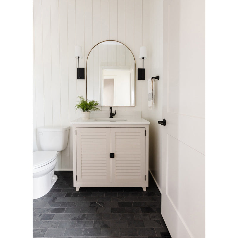 Lena 1 Light 4.5" Sconce in Black Forged in a room setting