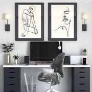 Lena 1 Light 4.5" Sconce in Black Forged in a room setting