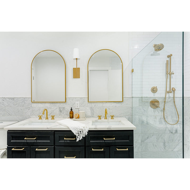 Lena 1 Light 4.5" Sconce in Vibrant Gold in a room setting