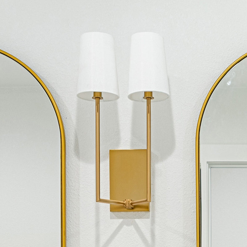 Lena 2 Light 10" Sconce in Vibrant Gold in a room setting