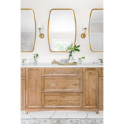 Lindee 24" Mirror in Antique Gold in a room setting