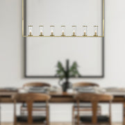 Revolve 47" 7-Light Linear Pendant in Clear Glass/Natural Brass