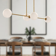 Cassia 48" 4-Light Linear Pendant in Aged Gold/Opal Matte Glass