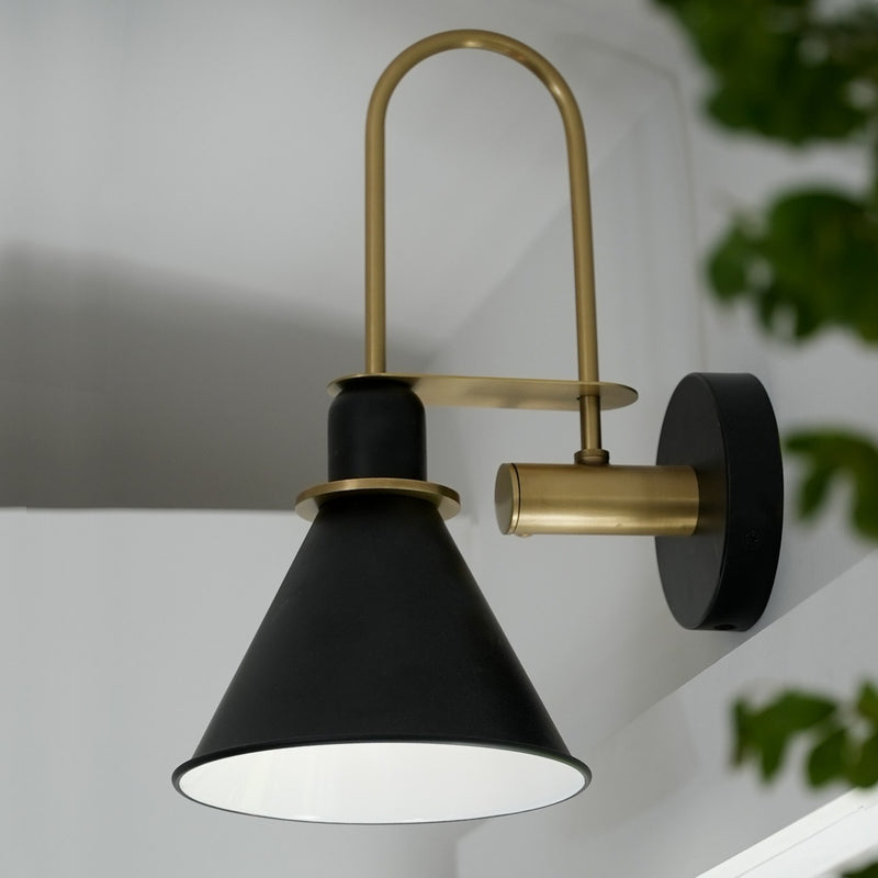 Medford 1 Light 7" Task Sconce in Matte Black in a room setting