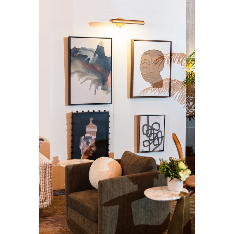 Miller 1 Light 21.5" Integrated LED Picture Light in Aged Brass in a room setting