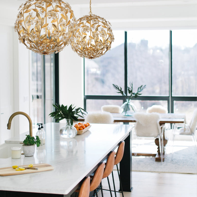Marselle 6 Light 22" Chandelier in Antique Gold in a room setting