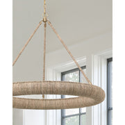 Oakley 1 Light 32" Integrated LED Chandelier in Soft Gold in a room setting