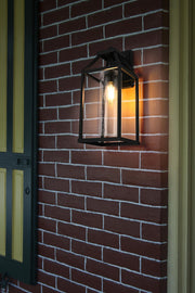 Zora 8" Outdoor Wall Lantern in Black And Clear