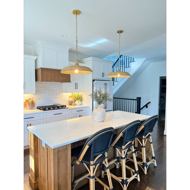 Odessa 1 Light 20.5" Pendant in Soft Gold in a room setting